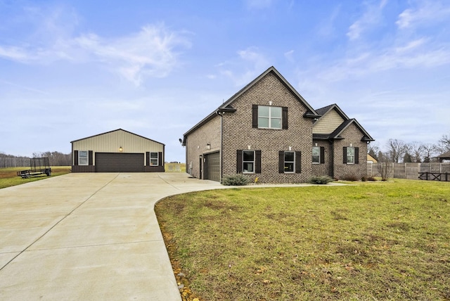 view of front of home with a garage and a front yard