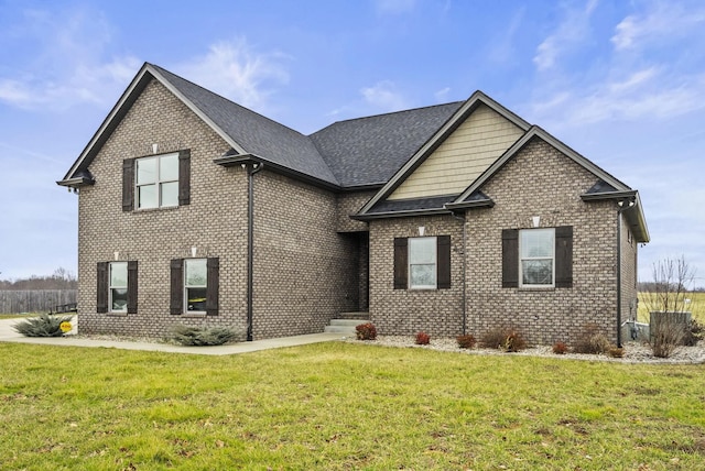 view of front property featuring a front lawn