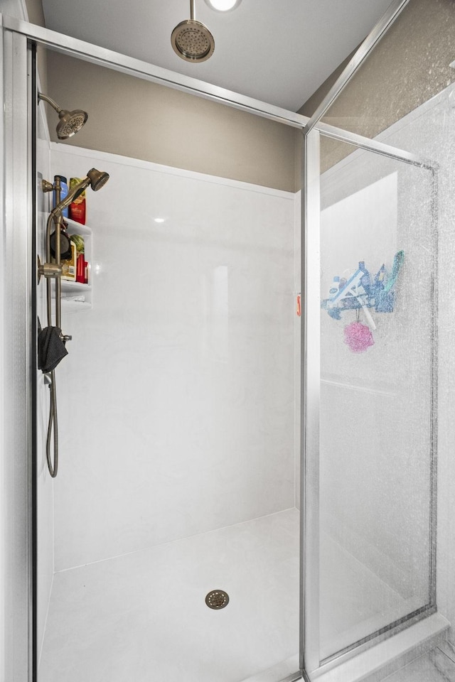 bathroom featuring walk in shower