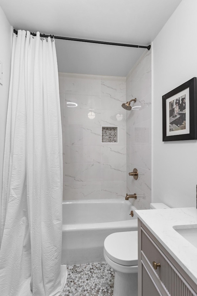 full bathroom with toilet, vanity, and shower / bathtub combination with curtain