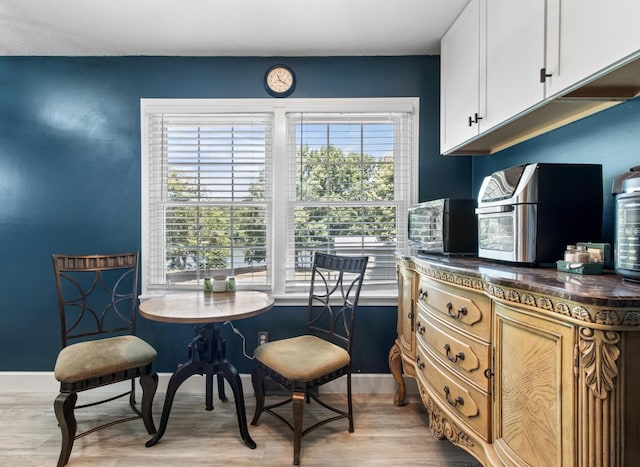 dining space featuring light hardwood / wood-style flooring