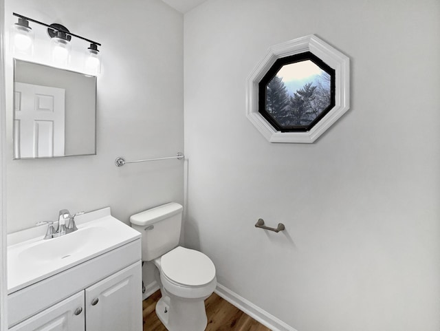 3556 Forest Park Rd, Springfield, TN 37172 - bathroom with toilet, wood finished floors, vanity, and baseboards