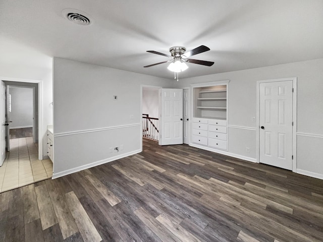 3556 Forest Park Rd, Springfield, TN 37172 - unfurnished bedroom with wood finished floors, baseboards, ensuite bathroom, and a ceiling fan