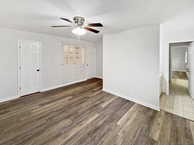 3556 Forest Park Rd, Springfield, TN 37172 - unfurnished bedroom with wood finished floors, baseboards, and ceiling fan