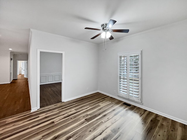3556 Forest Park Rd, Springfield, TN 37172 - spare room featuring ceiling fan, wood finished floors, ornamental molding, and baseboards