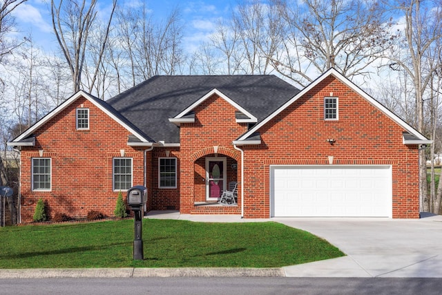 front facade featuring a garage and a front yard