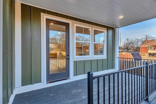 property entrance with board and batten siding