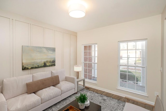 living room with wood-type flooring