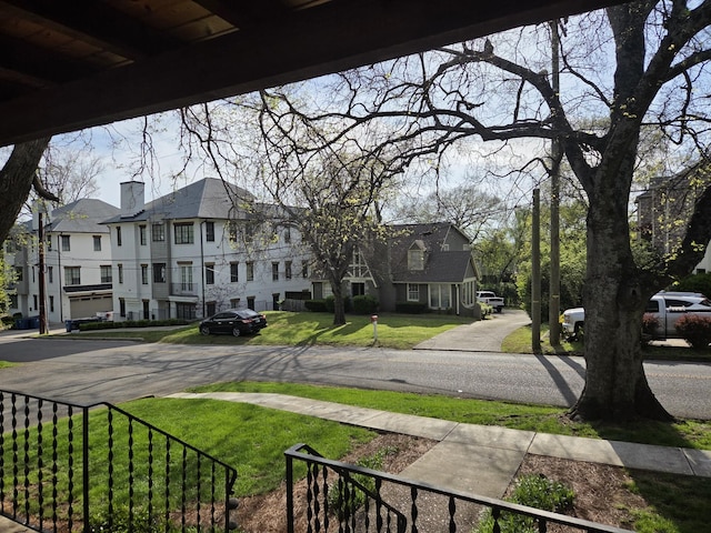 view of yard featuring a residential view