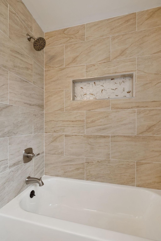 full bath featuring bathtub / shower combination