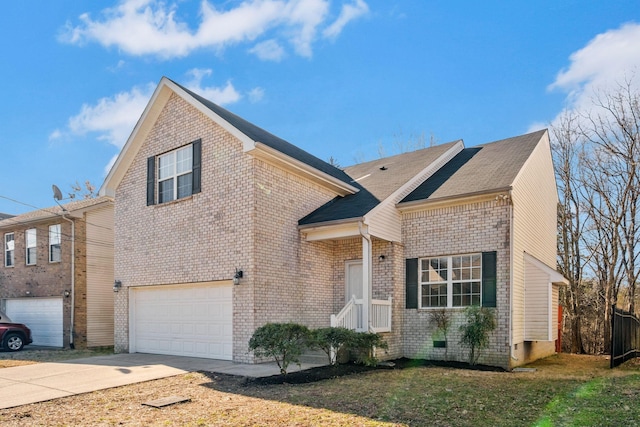 traditional-style house featuring a garage, a front lawn, concrete driveway, and brick siding