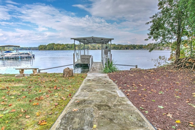 view of dock with a water view