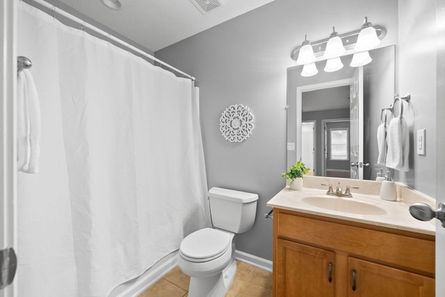 bathroom featuring tile patterned flooring, vanity, toilet, and a shower with shower curtain