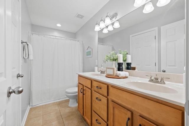 bathroom with a shower with shower curtain, vanity, toilet, and tile patterned flooring