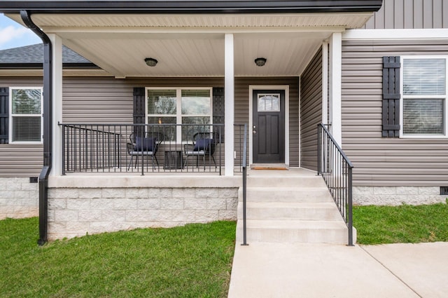 doorway to property with a porch