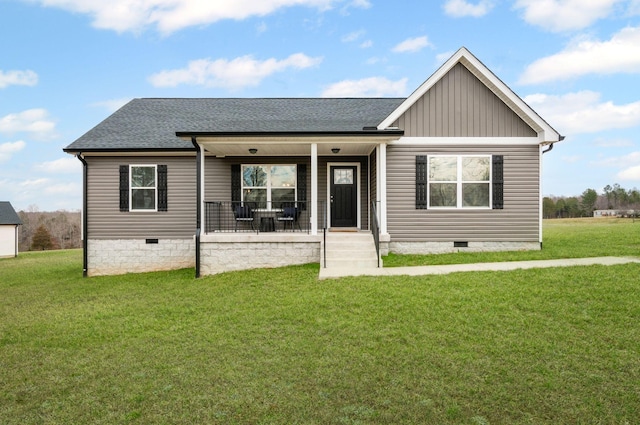 view of front facade with a porch and a front lawn