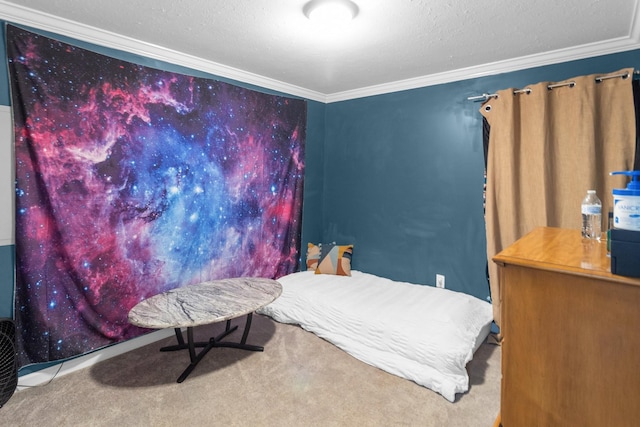 bedroom featuring ornamental molding, carpet floors, and a textured ceiling