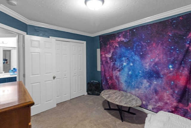 living area featuring ornamental molding, carpet flooring, and a textured ceiling