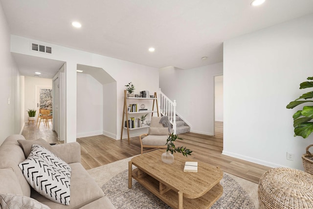 living room with light hardwood / wood-style floors