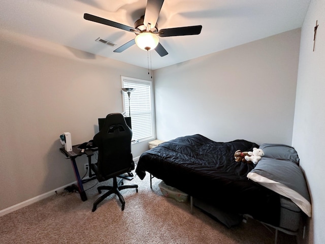 carpeted bedroom with ceiling fan