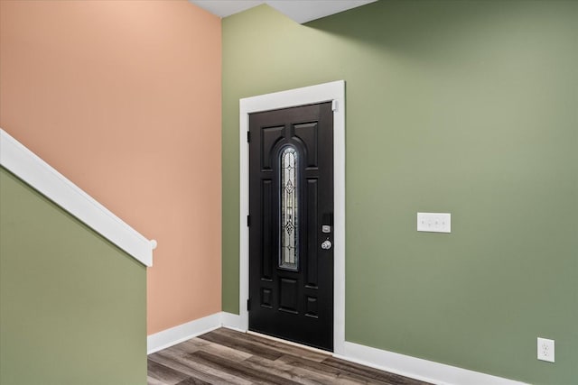 entryway with hardwood / wood-style floors