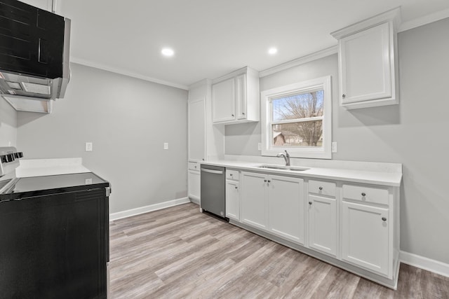 kitchen featuring electric range, dishwasher, light countertops, white cabinetry, and a sink