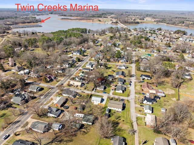 birds eye view of property featuring a residential view and a water view