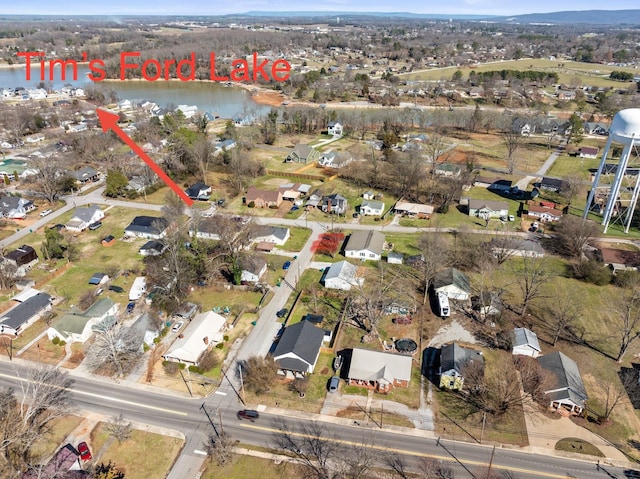 aerial view featuring a residential view and a water view