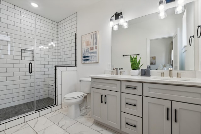 bathroom featuring vanity, toilet, and an enclosed shower