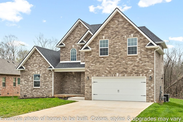 craftsman house with a garage, a front yard, and central air condition unit