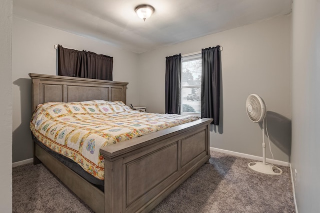 bedroom featuring dark colored carpet