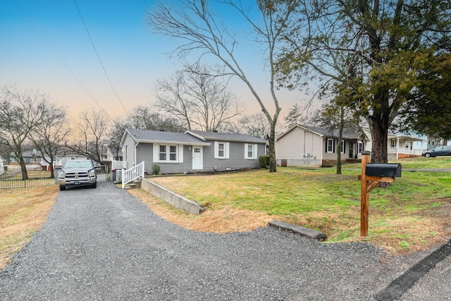 view of front of home featuring a yard