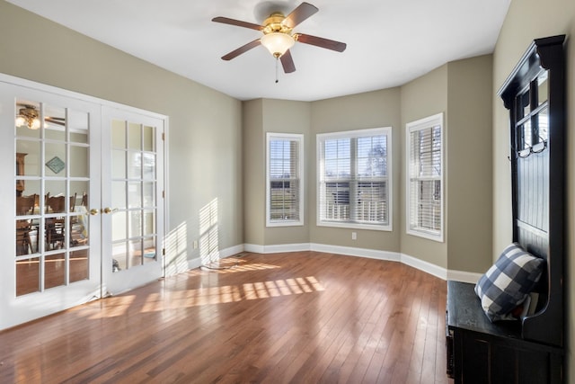 interior space featuring french doors, ceiling fan, and hardwood / wood-style floors