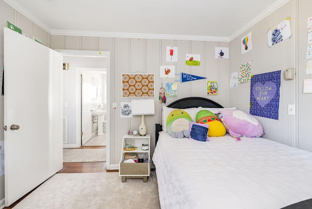 bedroom with crown molding