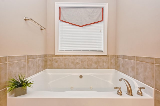 bathroom with a tub