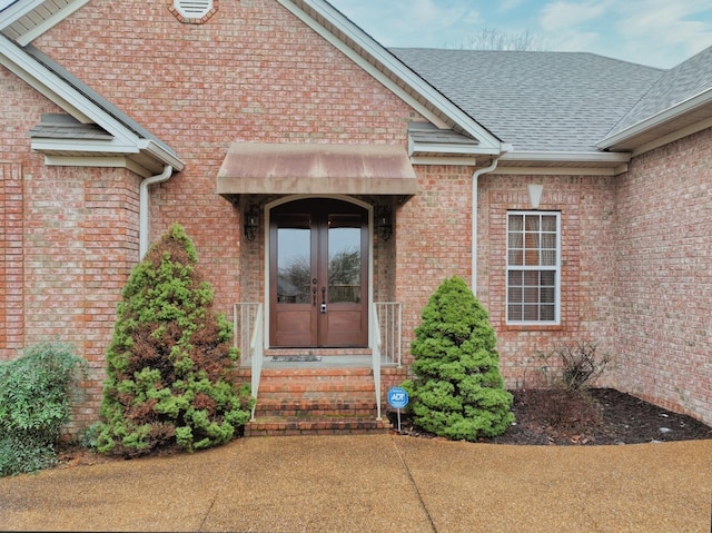 doorway to property with french doors