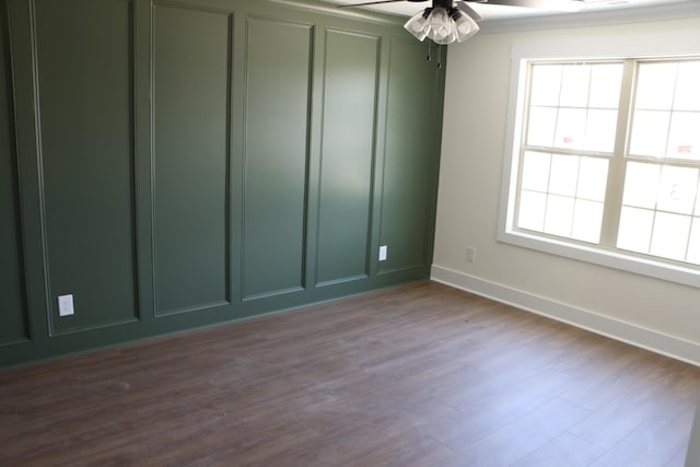 3 Charleston Cv, Clarksville, TN 37043 - empty room featuring a ceiling fan and dark wood-style flooring