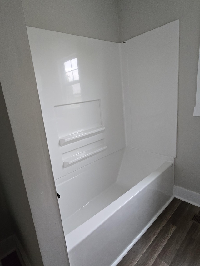 bathroom featuring wood-type flooring