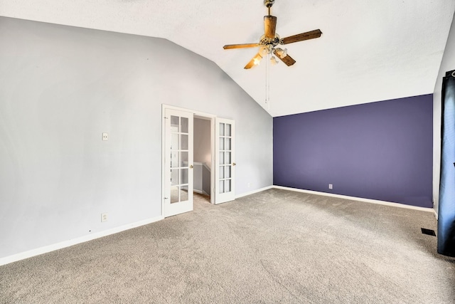 unfurnished bedroom with french doors, high vaulted ceiling, a textured ceiling, carpet flooring, and ceiling fan