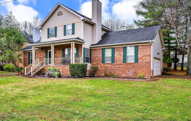 front of property with a garage, a front lawn, and a porch