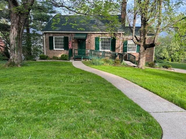 115 Maplemere Dr, Clarksville, TN 37040 - view of front of property with brick siding and a front lawn