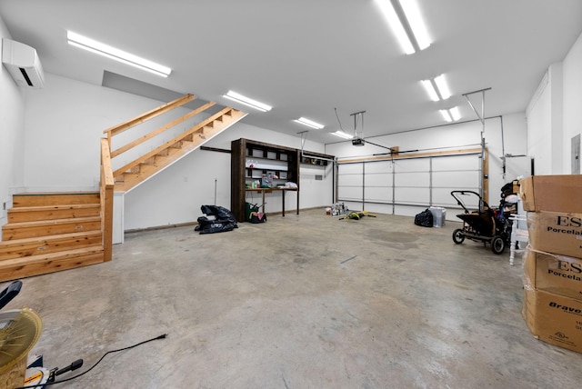 garage featuring a garage door opener and a wall unit AC