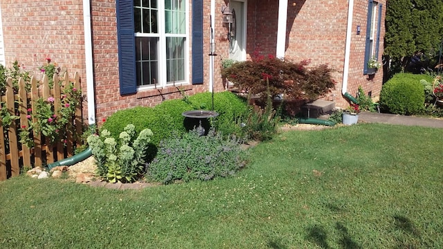 view of home's exterior featuring a lawn