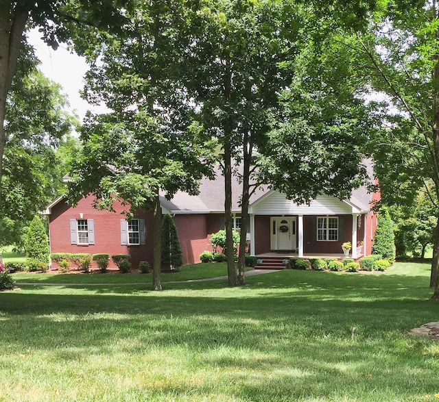 view of front of house with a front lawn