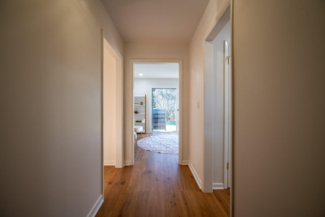 hall with light wood-type flooring