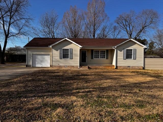 single story home with a garage