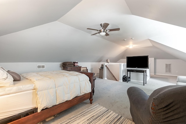 carpeted bedroom featuring vaulted ceiling and ceiling fan