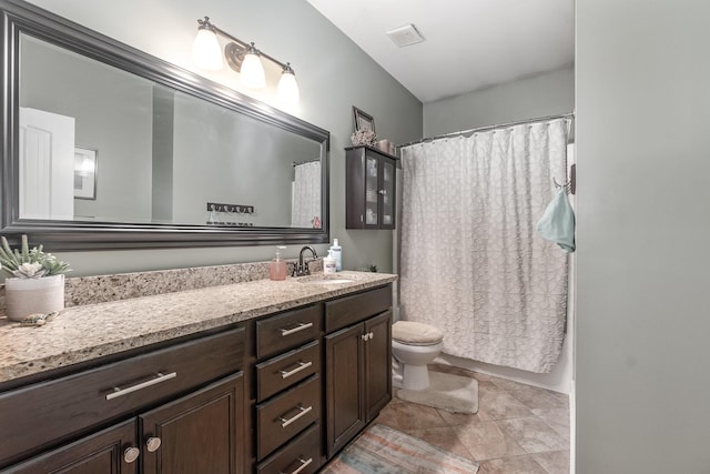 full bathroom featuring vanity, toilet, and shower / bath combo