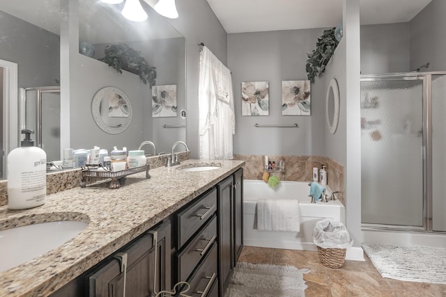 bathroom featuring tile patterned floors, vanity, and separate shower and tub