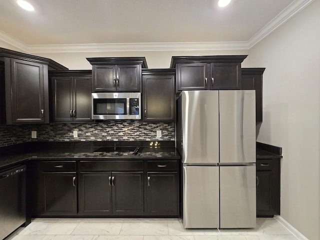 kitchen with crown molding, dark stone countertops, backsplash, and black appliances